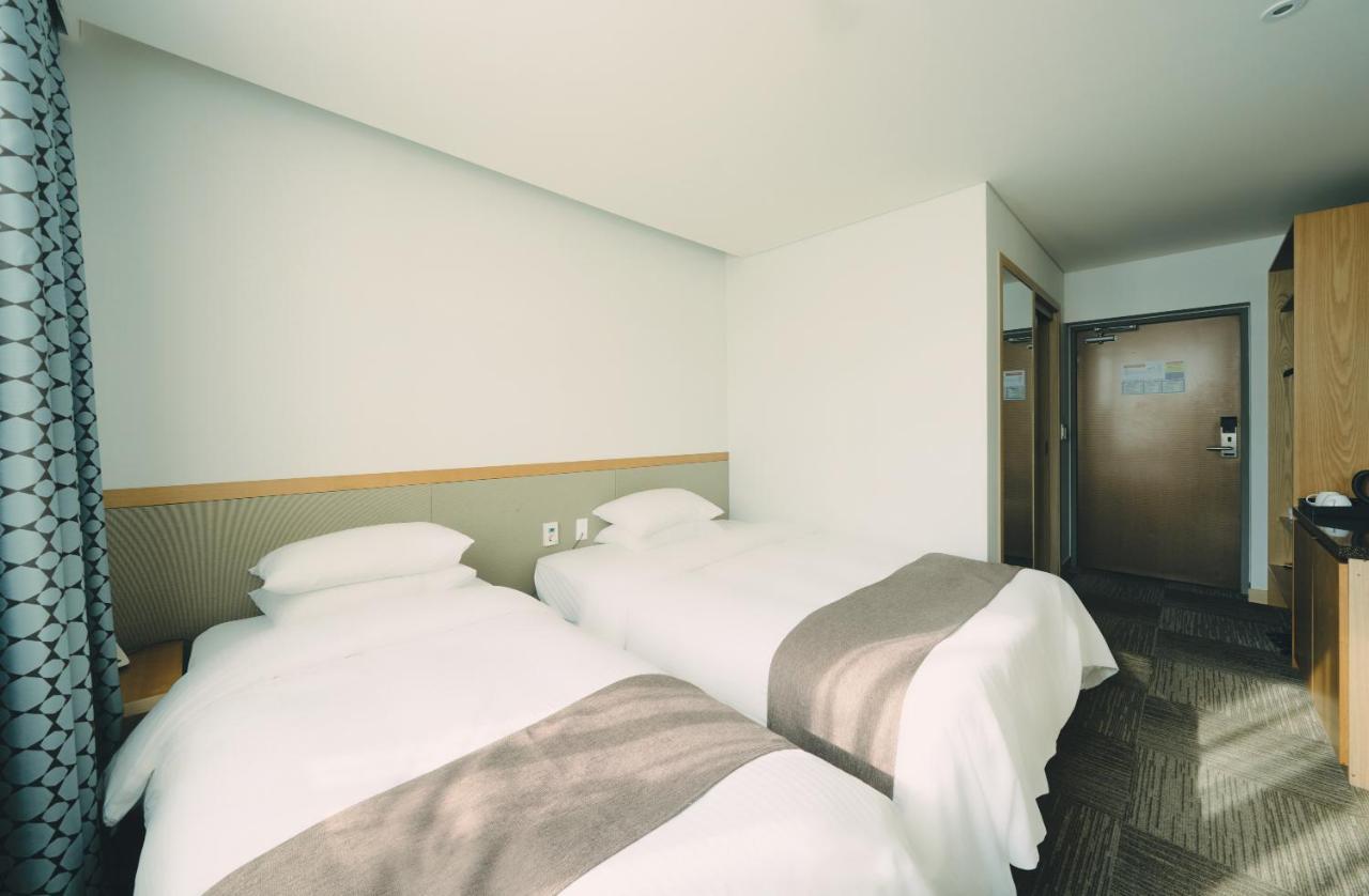 Jeju Poong Gyung Hotel Seogwipo Exterior photo